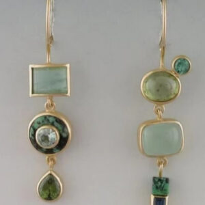 Geometric green stone round eye drop earrings for women displayed against a neutral background